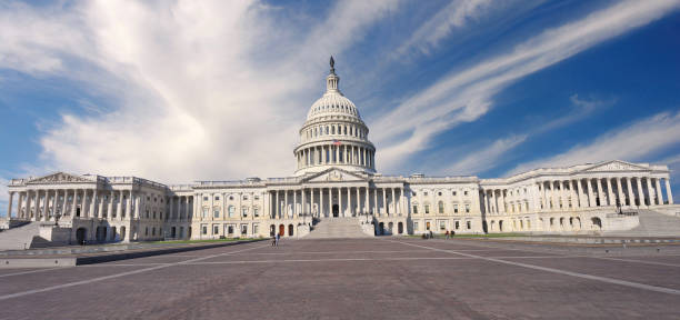 istock Panoramic view of US Capitol in Washington DC with blue sky background 2178623336
