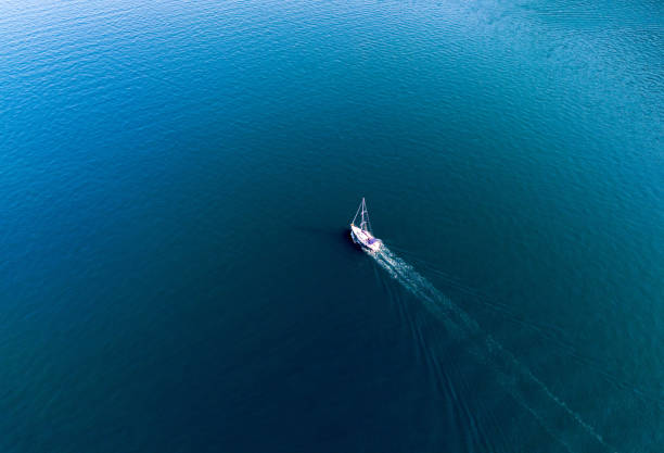 istock Yacht sailing on the sea without a sail on the motor. View from a drone 2178626708