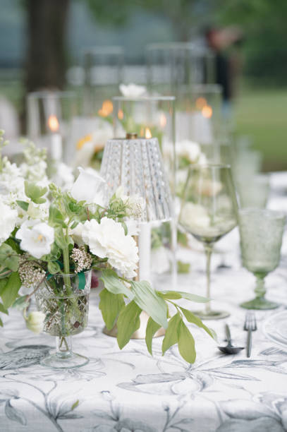 istock Green and White Wedding Day Reception Tablescape Centerpieces Design 2178630432