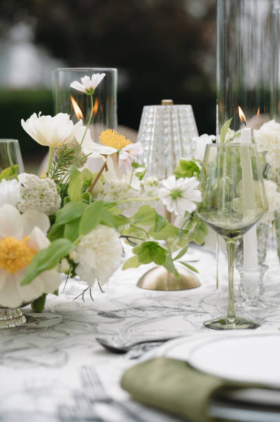 istock Green and White Wedding Day Reception Tablescape Centerpieces Design 2178630495