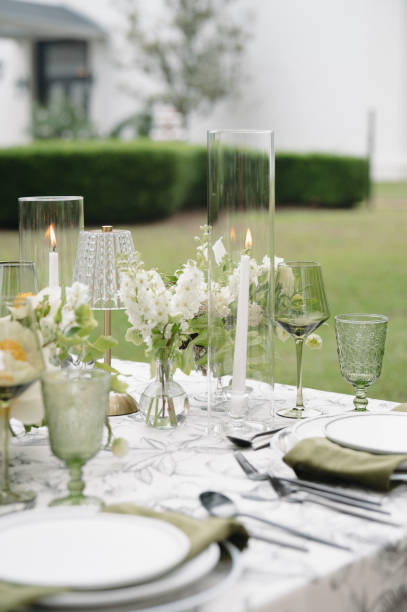 istock Green and White Wedding Day Reception Tablescape Centerpieces Design 2178630496