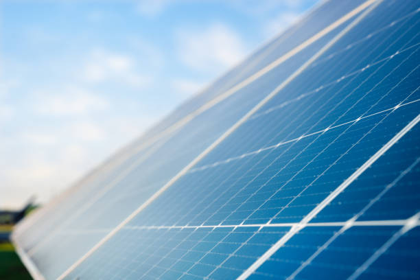 istock Modern solar panels in a solar farm converting sunlight into clean electricity. Durable installation on green grass, representing renewable energy and environmental conservation concepts 2178636678