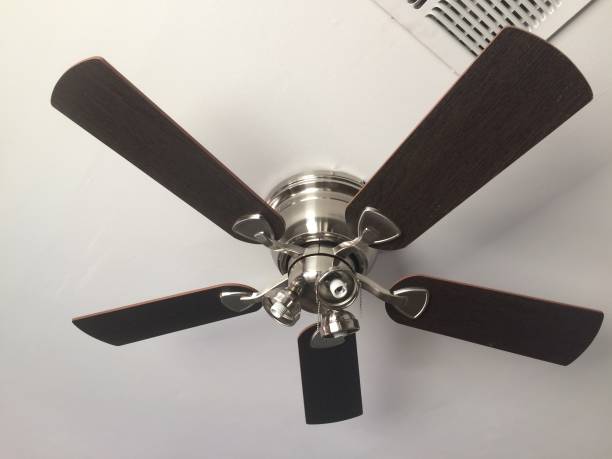 istock Ceiling Fan Installed in a Home Living Room 2178637638