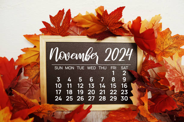 istock Autumn maple leaves decoration with wooden chalkboard easel empty mockup space for text 2178638211