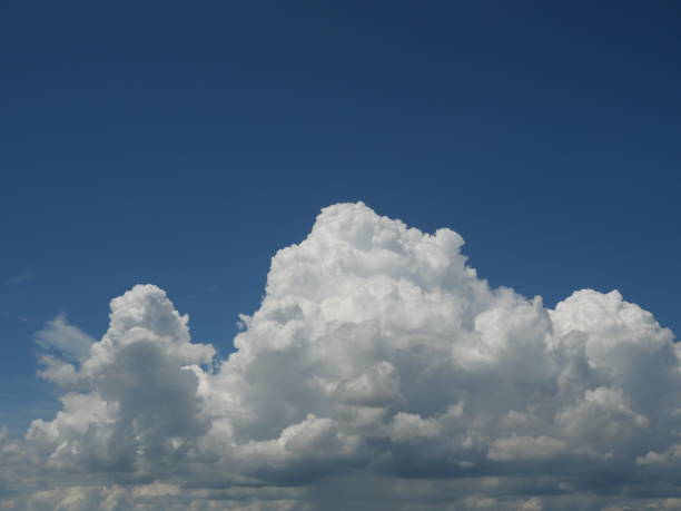istock Cumulonimbus cloud formations on tropical sky 2178640076