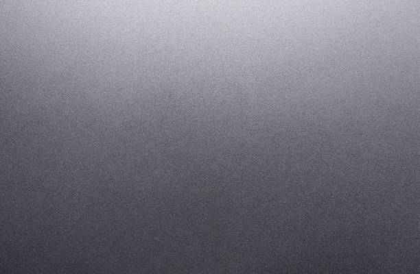 istock Dark gray silver background, featuring a rough, grungy grain texture. shiny silver foil abstract background for design. 2178643273