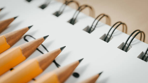 istock Concept background of various pencils and notebooks used while studying for exams. 3d rendering 2178643502