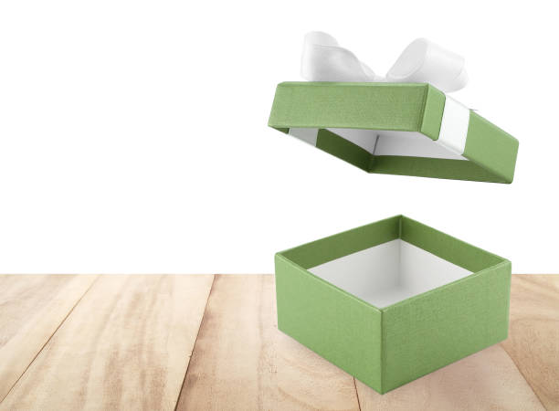 istock single open empty green gift box with ribbon bow on table floor isolated on white background 2178643539
