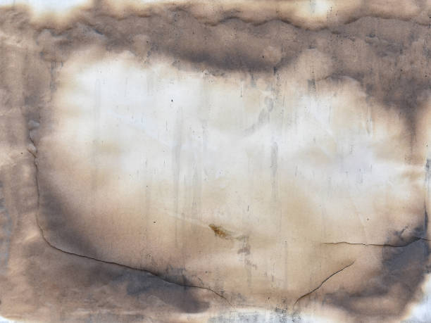 close-up burnt white paper with dirty stain