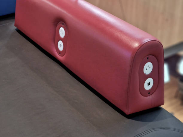 padded bench with leather cover. there is a usb c socket for charging phones and laptops. modern furniture for mall arcades