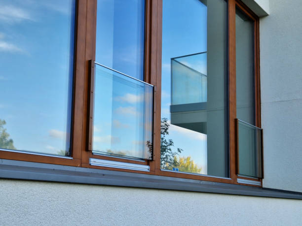 istock We installed prepared anchors from aluminum mobile scaffolding using stainless steel rails. railing is made of hardened, glued safety film and protects children from falling out when window open 2178652607