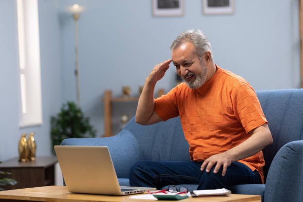 istock senior man using laptop at home stock photo 2178653989