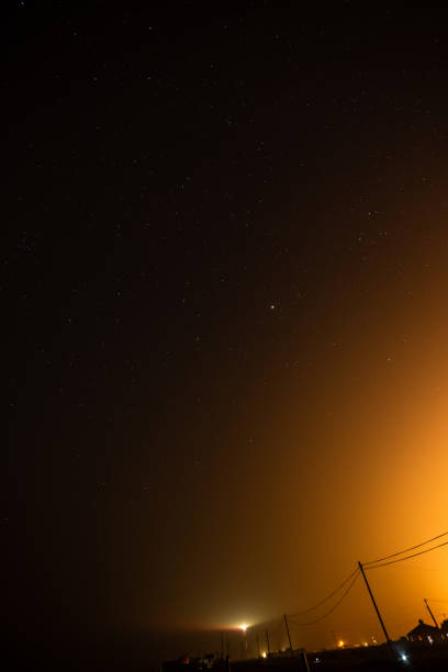 Power line next to power station at night Dungeness Kent England Europe