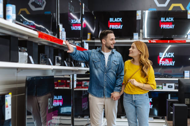 istock Couple shopping for electronics during Black Friday sales event 2178663767