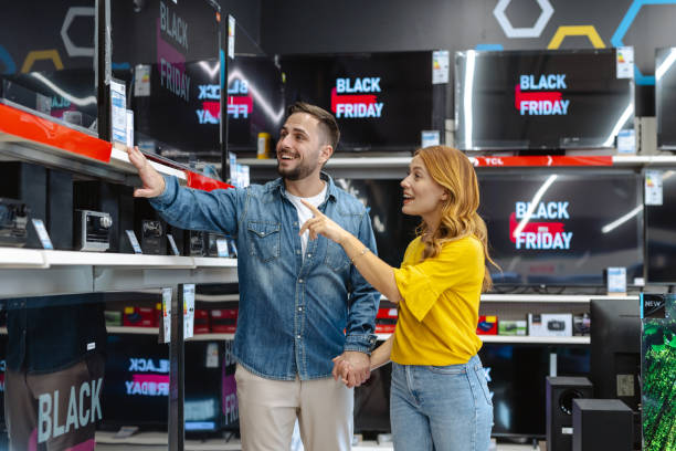 istock Couple shopping for electronics during Black Friday sales event 2178663771