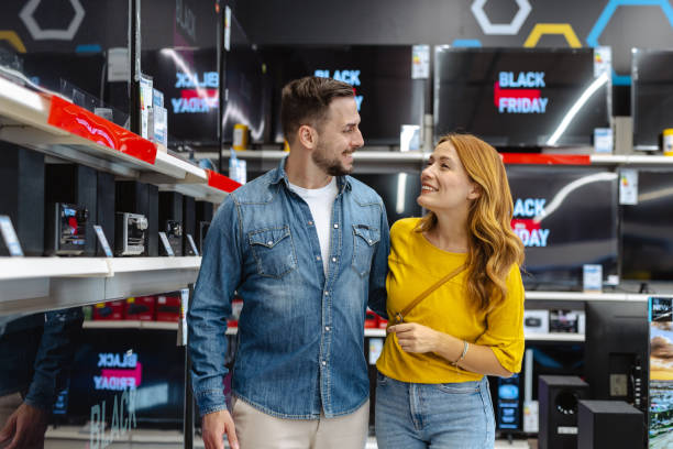 istock Happy couple shopping for electronics during Black Friday sale 2178663825