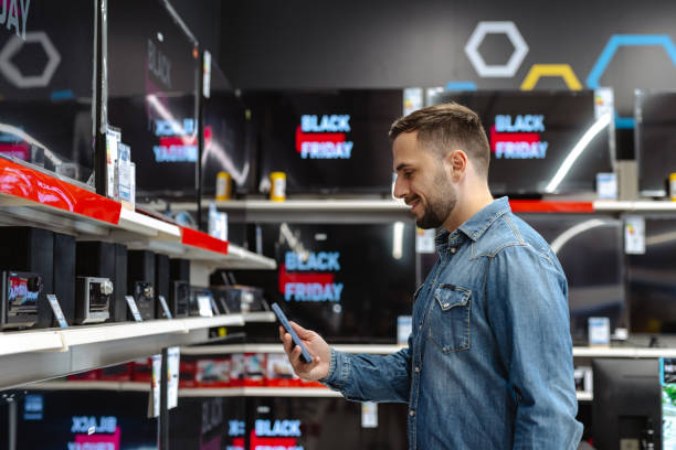 istock Young man shopping for electronics during a Black Friday sale 2178663828