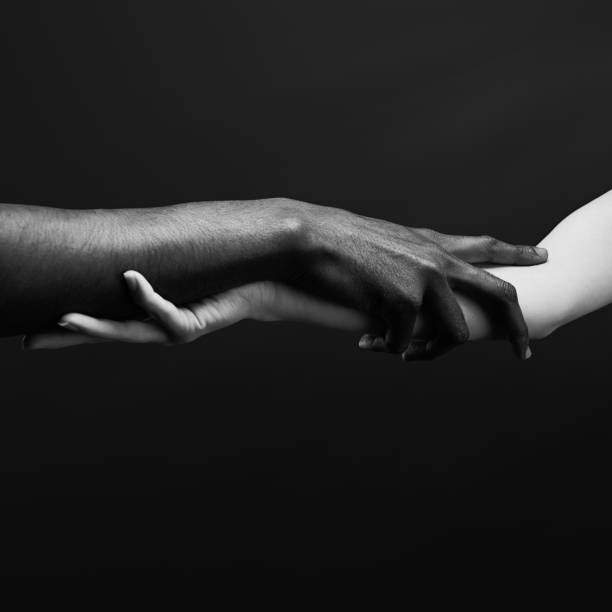 istock Two hands gripping each other. Human relations, unity, togetherness, symbolism concept 2178664740