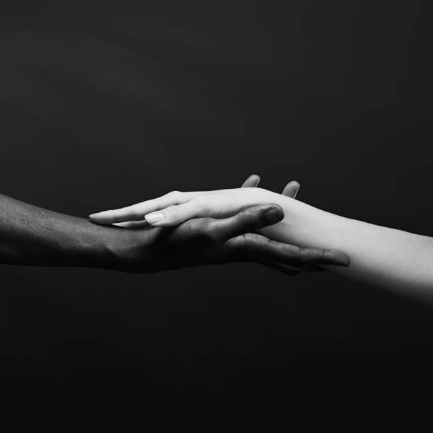 istock Two hands gripping each other. Human relations, unity, togetherness, symbolism concept 2178664864