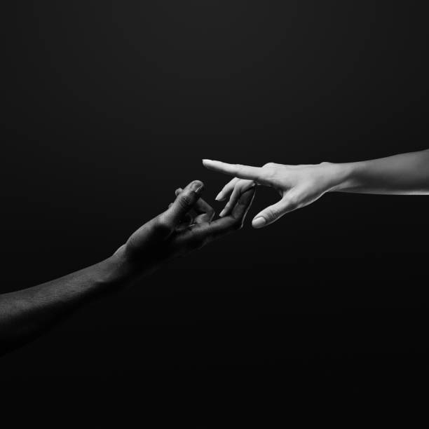 istock Two hands reaching for each other, flirting. Human relations, unity, togetherness, symbolism concept 2178665082