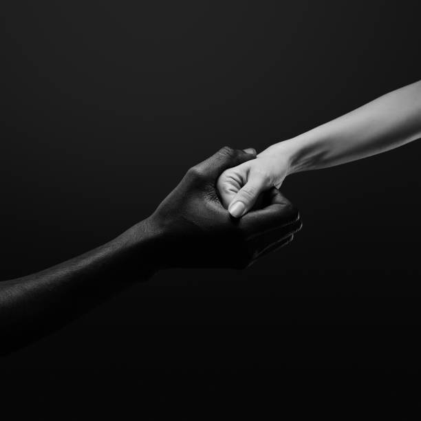 istock Two hands gripping each other. Human relations, power, unity, togetherness, symbolism concept 2178665084