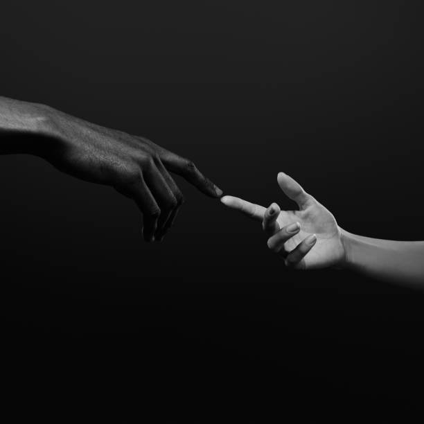 istock Two hands reaching for each other. Human relations, unity, togetherness, symbolism concept 2178665175
