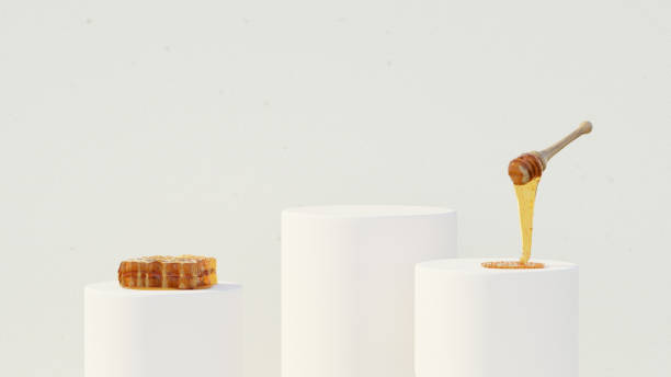 istock Background with an empty product display mockup featuring a white  backdrop and honey on  geometric platforms designed for showcasing merchandise, the scene includes soft lighting in landscape 2178665206