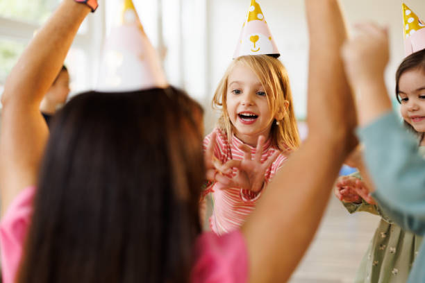 Young girls celebrating a birthday