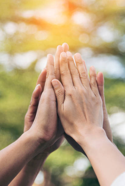 istock Vertical Horizon Group of teamwork high five team together hands raise up power partner. Diversity multiethnic business people hands success team together. Vertical Collaborate Volunteer partner win 2178668088