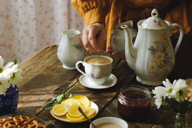 istock Woman drinking tea with milk and sugar. 2178669389