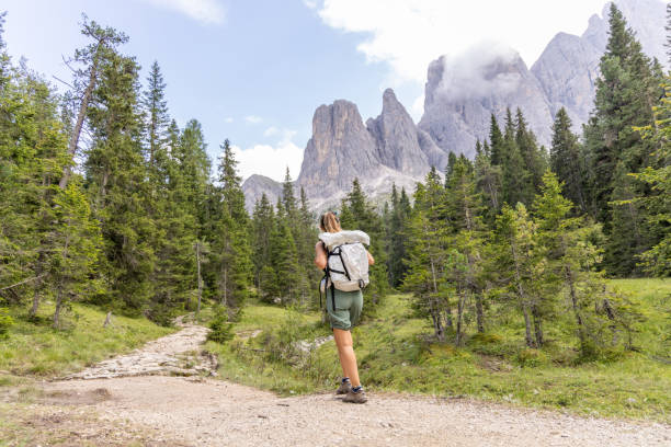 istock Female Hiker Walking on Mountain Trail 2178669812