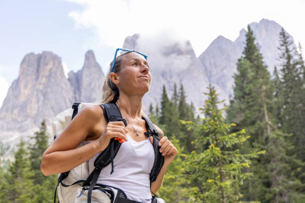 istock Woman hiking in the Dolomites 2178669946