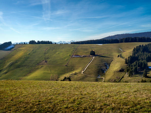 Mountain landscape with green hills and blue sky, in Asiago, Italy