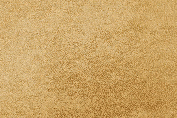 istock Cloth structure of jacquard yellow fabric with abstract shabby texture background closeup, macro 2178673368