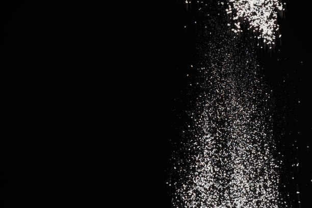 istock Abstract black and white background of pouring flour, space for text 2178675534