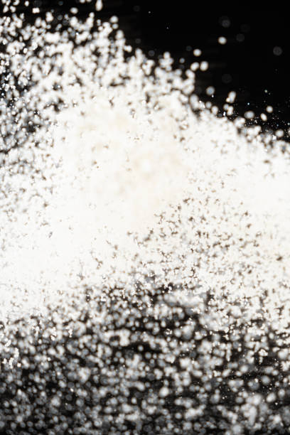 istock Abstract black and white background of pouring flour, space for text 2178675542