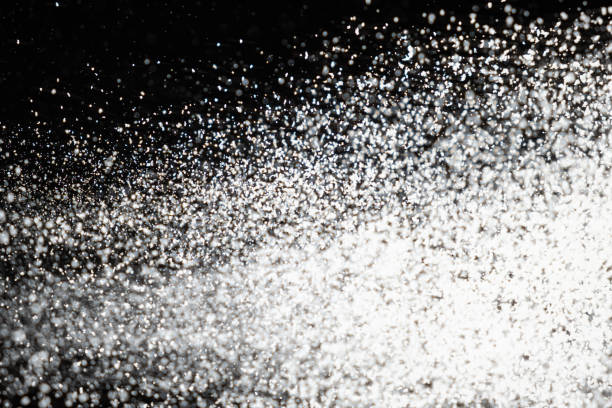 istock Abstract black and white background of pouring flour, space for text 2178675546