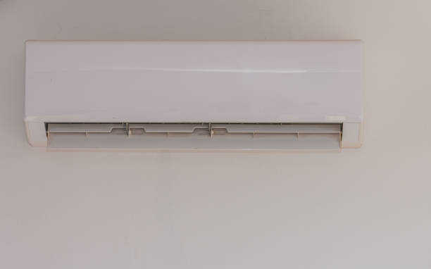 istock A Sleek White Air Conditioning Unit Mounted on a Wall Providing Cool Comfort During the Warm Summer Months in a Modern Living Space 2178676159