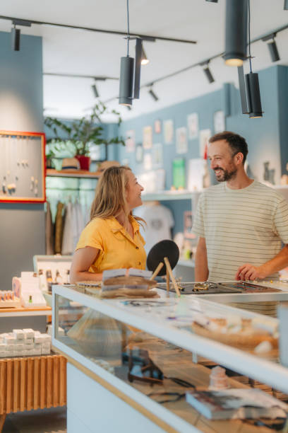 istock Happy couple choosing a necklace for her 2178678951