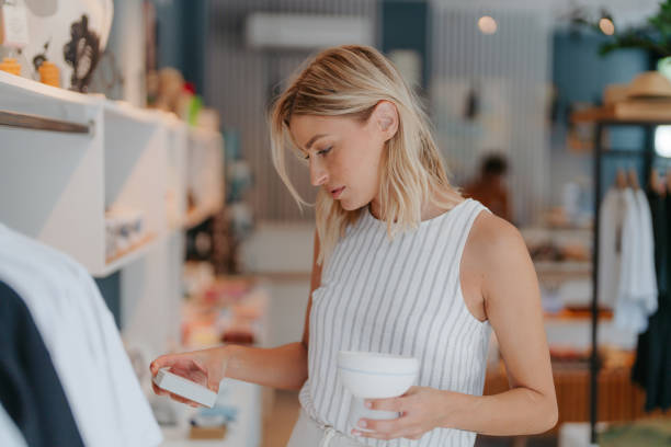 istock Beautiful Woman Selecting Souvenirs 2178678978