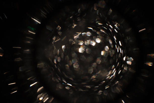 Background of silver and bright lens flare lights. Abstract image