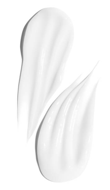 istock Two cream smears arranged on an empty background. Beauty care, smooth texture. 2178682216