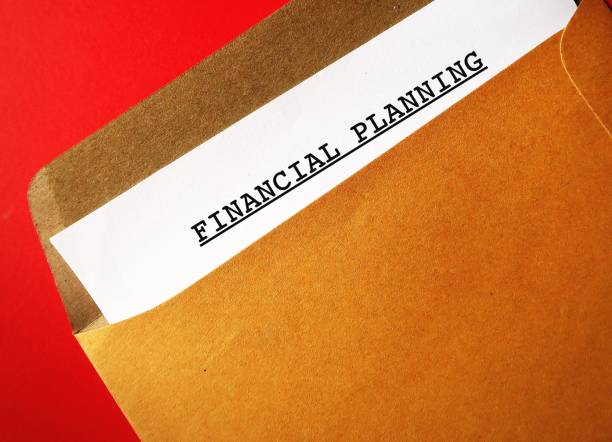 istock Office envelope with document typed FINANCIAL PLANNING, concept of money plan approach to meet life goals or helps take control of income, expenses and investments 2178683113