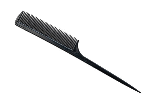 Black plastic hair comb isolated on white background close up