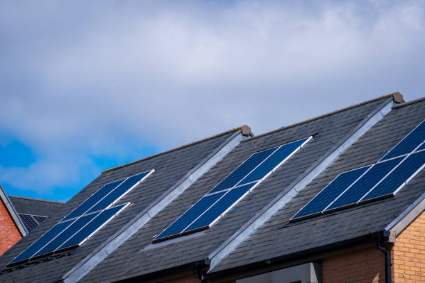 istock Solar energy panel on new built house roof in england uk 2178683771