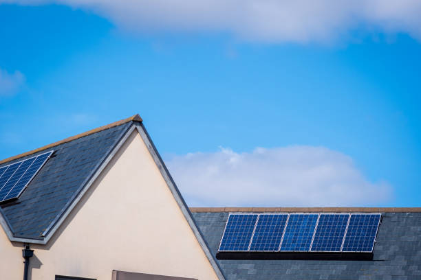 istock Solar energy panel on new built house roof in england uk 2178683775