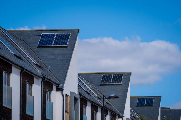 istock Solar energy panel on new built house roof in england uk 2178683779