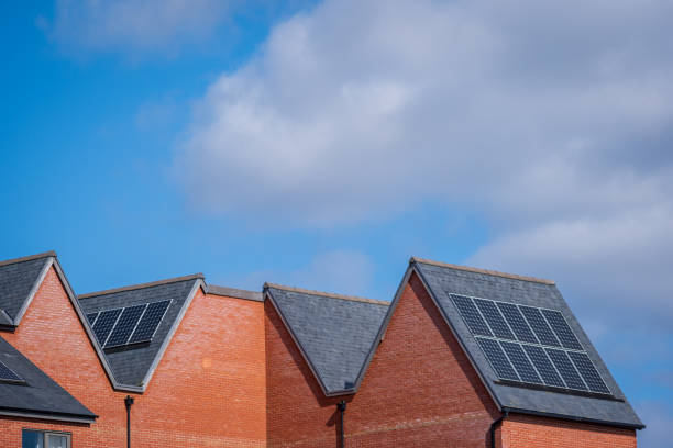 istock Solar energy panel on new built house roof in england uk 2178683782