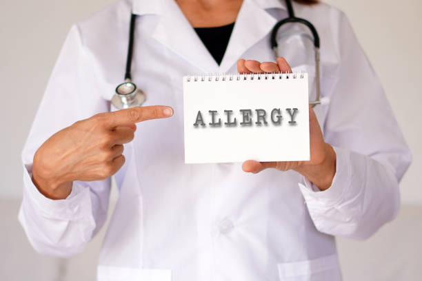istock Allergy concept. woman doctor pointing to a notepad 2178683855