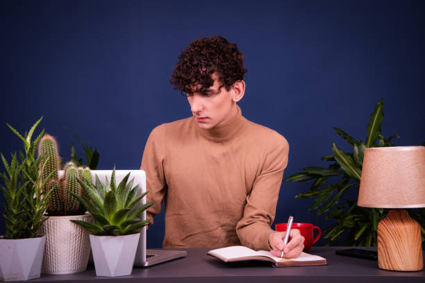 istock A young attractive guy and dating on the Internet. 2178685000